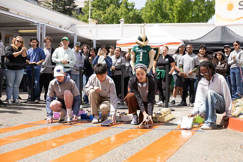 Student racing solar powered cars