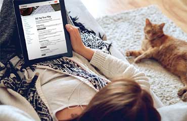 Woman looking at iPad with SMUD website