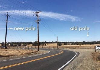 shows old and new pole locations near the road