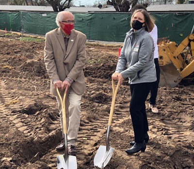 SMUD board members Rob Kerth and Heidi Sanborn breaking ground at the construction site.